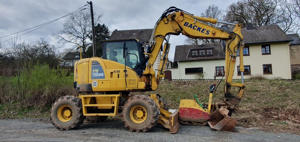 Gebrauchter Komatsu Kompakt Mobilbagger PW118 MR-11 Gebrauchter Komatsu Kompakt Mobilbagger PW118 MR-11